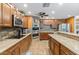 Updated kitchen featuring granite countertops, stainless steel appliances, and plenty of cabinet space at 3919 S Siesta Ln, Tempe, AZ 85282