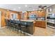 Well-appointed kitchen with granite countertops, stainless steel appliances, and a breakfast bar at 3919 S Siesta Ln, Tempe, AZ 85282