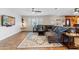 Inviting living room complete with TV, comfortable sectional, and decor that enhances the space at 3919 S Siesta Ln, Tempe, AZ 85282