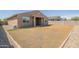 Spacious backyard featuring a covered patio and low-maintenance landscaping at 4084 E Caitlin Dr, San Tan Valley, AZ 85140