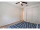 Bedroom featuring carpet, a ceiling fan, and a closet for storing your belongings at 4084 E Caitlin Dr, San Tan Valley, AZ 85140