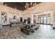 Expansive common area featuring a modern kitchen, seating, and plenty of natural light, ideal for community gatherings at 4084 E Caitlin Dr, San Tan Valley, AZ 85140