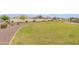 Lush community green space with mature landscaping and walking paths at 4084 E Caitlin Dr, San Tan Valley, AZ 85140