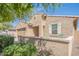 Close up of the exterior featuring lush landscaping, and charming window seating at 4084 E Caitlin Dr, San Tan Valley, AZ 85140