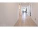 Bright hallway offering seamless access to the living area, kitchen, and bedrooms at 4084 E Caitlin Dr, San Tan Valley, AZ 85140