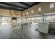 Expansive outdoor patio featuring covered seating, a fireplace, and a view of the pool, perfect for relaxation and entertainment at 4084 E Caitlin Dr, San Tan Valley, AZ 85140