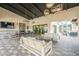 Outdoor patio with lounge seating, a picnic table, and a bar, perfect for enjoying the community's amenities at 4084 E Caitlin Dr, San Tan Valley, AZ 85140