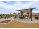 Community picnic area featuring shaded seating, tables, and well-maintained landscaping for outdoor gatherings at 4084 E Caitlin Dr, San Tan Valley, AZ 85140