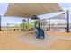 Modern community playground with slides, climbing structures, and shaded areas for enjoyment at 4084 E Caitlin Dr, San Tan Valley, AZ 85140