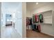 Spacious walk-in closet with built-in shelving and hanging rods, adjacent to the Primary suite at 4084 E Caitlin Dr, San Tan Valley, AZ 85140