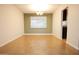 Inviting dining room with tiled floors and large window at 4841 W Mercer Ln, Glendale, AZ 85304