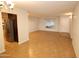 Spacious living room featuring tile floors, neutral walls, and lots of natural light at 4841 W Mercer Ln, Glendale, AZ 85304