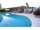 Beautiful backyard pool with covered patio, seating area, and outdoor grill, perfect for entertaining at 4841 W Mercer Ln, Glendale, AZ 85304