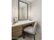Bathroom vanity features a white countertop and a framed mirror with decorative lighting at 5533 E Stella Ln, Paradise Valley, AZ 85253