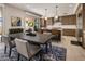 Elegant dining room showcasing a modern layout with an open flow to the kitchen and outdoor space at 5533 E Stella Ln, Paradise Valley, AZ 85253