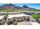 Beautiful exterior elevation with modern design, garages, and desert landscaping details at 5533 E Stella Ln, Paradise Valley, AZ 85253