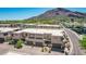 Exterior elevation displaying modern architecture, desert landscaping, and convenient two-car garages at 5533 E Stella Ln, Paradise Valley, AZ 85253
