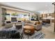 Bright, open living area featuring stylish furniture, elegant décor, and seamless indoor-outdoor flow at 5533 E Stella Ln, Paradise Valley, AZ 85253