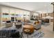 Bright, open living area featuring stylish furniture, elegant décor, and seamless indoor-outdoor flow at 5533 E Stella Ln, Paradise Valley, AZ 85253