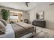 A spacious main bedroom features an outside patio and a decorative dresser with mirror at 5533 E Stella Ln, Paradise Valley, AZ 85253