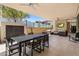 Expansive patio with dining and lounge areas, plus outdoor TV for entertaining at 5533 E Stella Ln, Paradise Valley, AZ 85253