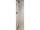 The shower features a textured tile wall, and a brushed metal shower head and handle at 5533 E Stella Ln, Paradise Valley, AZ 85253