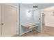 Hallway desk area provides a practical workspace in the well-lit area at 6043 E Des Moines St, Mesa, AZ 85205