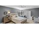 Cozy bedroom featuring a large window, desk, shelving and a mirrored nightstand at 6126 E Paradise Ln, Scottsdale, AZ 85254