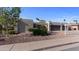 Stunning desert home featuring a spacious three-car garage and low-maintenance landscaping at 6126 E Paradise Ln, Scottsdale, AZ 85254
