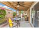 A covered back patio provides a cool spot for outdoor dining and relaxation at 6713 E Riverdale St, Mesa, AZ 85215