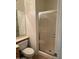 Bathroom features a glass shower door and tiled shower stall at 6967 W Potter Dr, Glendale, AZ 85308