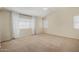 Spacious main bedroom with vaulted ceilings and multiple windows at 6967 W Potter Dr, Glendale, AZ 85308
