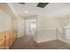 Upstairs hallway with built-in cabinets and access to another room at 6967 W Potter Dr, Glendale, AZ 85308