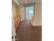 Upstairs hallway with built-in cabinets and doorway to another room at 6967 W Potter Dr, Glendale, AZ 85308