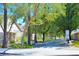 Street view with mature trees and sidewalks, showcasing a welcoming community at 6967 W Potter Dr, Glendale, AZ 85308