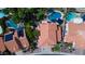 Overhead view highlighting roof details, landscaping, and community layout in a sunny residential area at 7015 W Behrend Dr, Glendale, AZ 85308