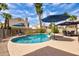 Inviting backyard pool and patio area, perfect for relaxation and entertaining at 7015 W Behrend Dr, Glendale, AZ 85308