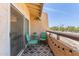 Charming balcony features an outdoor dining set, greenery, and open views, creating a relaxing retreat at 8055 E Thomas Rd # B208, Scottsdale, AZ 85251