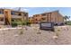 View of the Woodland Springs Condominiums complex with desert landscaping at 8055 E Thomas Rd # B208, Scottsdale, AZ 85251