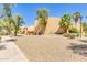 An exterior of the building with a desert landscape and various bushes and trees at 8055 E Thomas Rd # B208, Scottsdale, AZ 85251