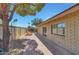 Enclosed backyard featuring a brick-lined patio and brick wall providing a private outdoor retreat at 8443 E Via De Los Libros --, Scottsdale, AZ 85258