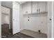 Laundry area with cabinets, neutral walls, and durable floors at 8443 E Via De Los Libros --, Scottsdale, AZ 85258