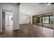 Open living room with a sliding glass door leading to the backyard at 8443 E Via De Los Libros --, Scottsdale, AZ 85258