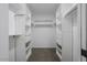 Walk-in closet with custom-built shelving and drawers at 8443 E Via De Los Libros --, Scottsdale, AZ 85258
