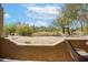 Private patio with desert landscaping and scenic views at 8880 E Paraiso Dr # 118, Scottsdale, AZ 85255