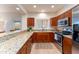 Modern kitchen with granite countertops, stainless steel appliances, and ample cabinet space at 8880 E Paraiso Dr # 118, Scottsdale, AZ 85255