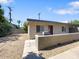 A single-story apartment featuring a private outdoor area with barbeque and gravel landscaping at 1219 E Colter St # 8, Phoenix, AZ 85014