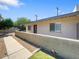 Charming exterior showcasing a well-maintained yard, a sidewalk, and a neutral color palette at 1219 E Colter St # 8, Phoenix, AZ 85014