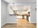 Open concept kitchen with stainless appliances and eat-in breakfast bar at 1219 E Colter St # 8, Phoenix, AZ 85014