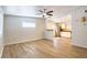Open living space features wood-look floors and light walls at 1219 E Colter St # 8, Phoenix, AZ 85014